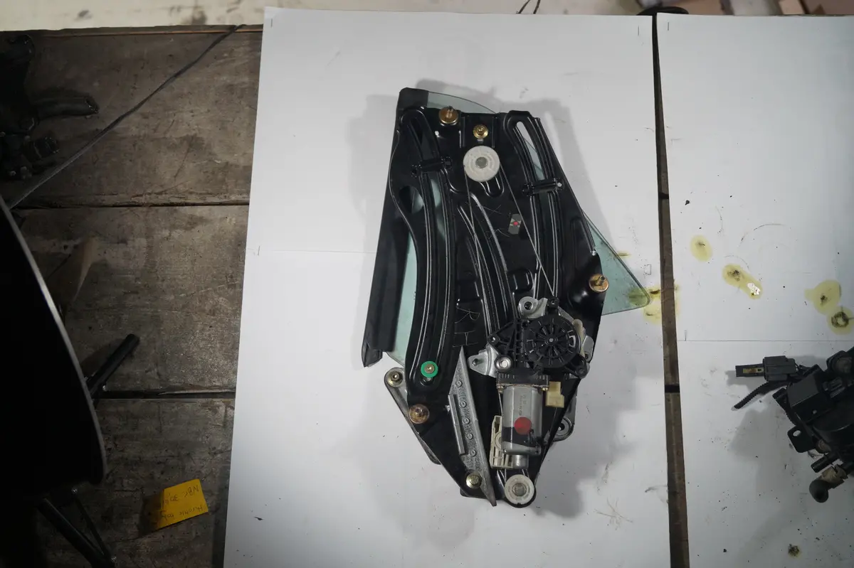 Used Jaguar Rear 1/4 Window Regulator Assembly With Glass Part # C2n3913. Fits Jaguar Xk8,Xkr 1997-2006. 1